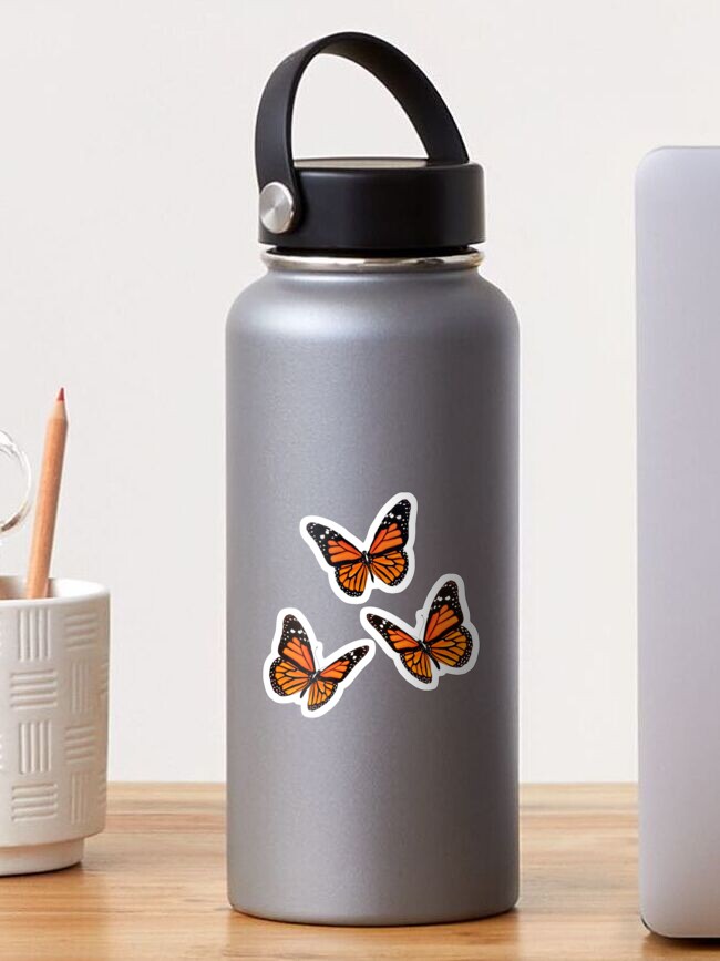 Orange monarch butterfly pack Sticker for Sale by Zippolighter