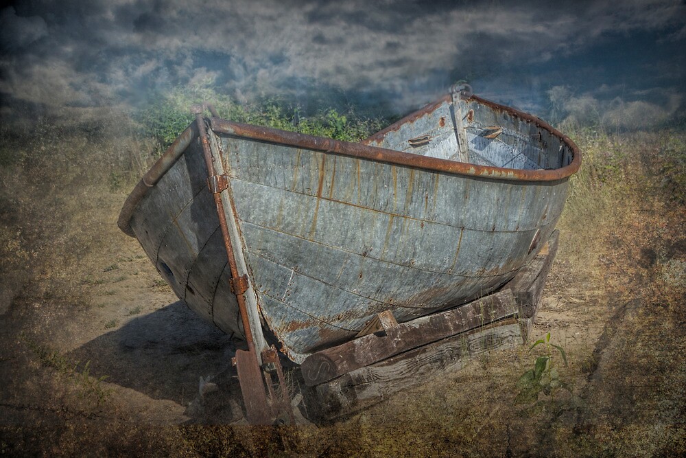 "Old Historical Fishing Boat on shore" by Randall Nyhof 