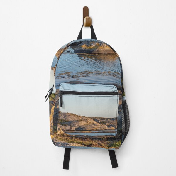 Item preview, Rocky coast in the evening sunshine designed and sold by EngineerGoC.