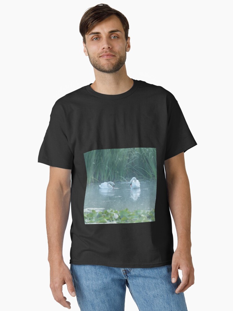 Thumbnail 2 of 7, Classic T-Shirt, Two white swans on the morning lake designed and sold by steppeland.