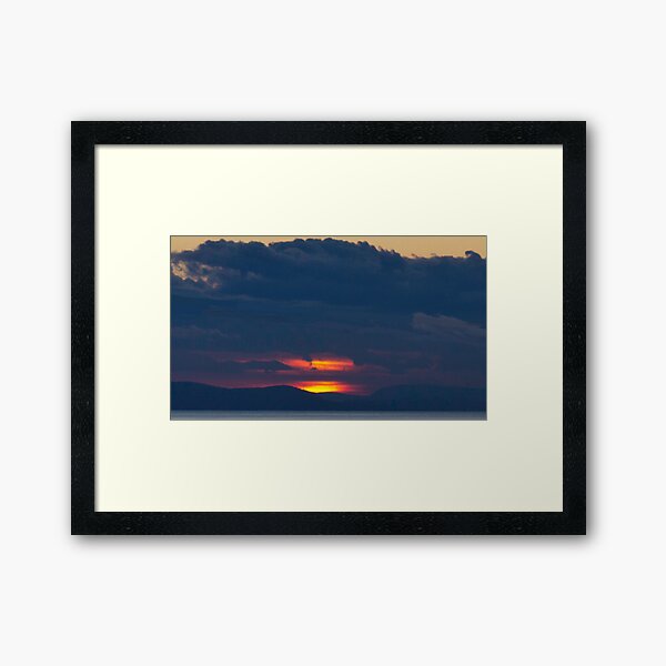 Slice of sunset Framed Art Print