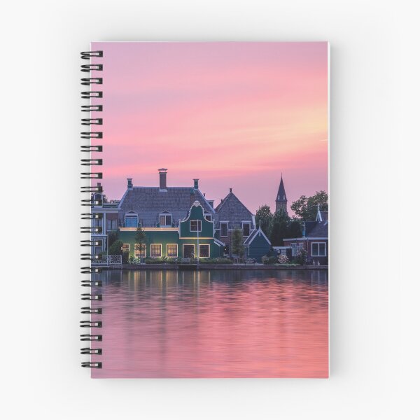 Item preview, Typical Dutch houses at Zaanse Schans, Holland Panorama during sunset with pink sky designed and sold by michieldros.
