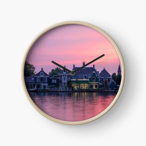 Item preview, Typical Dutch houses at Zaanse Schans, Holland Panorama during sunset with pink sky designed and sold by michieldros.