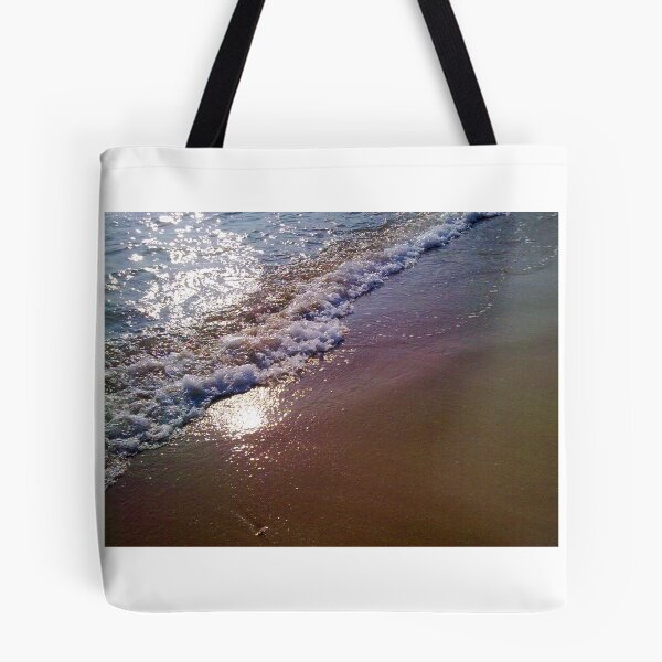 Item preview, Reflejo de la luz del sol en una playa espumosa designed and sold by HeatherPhn.