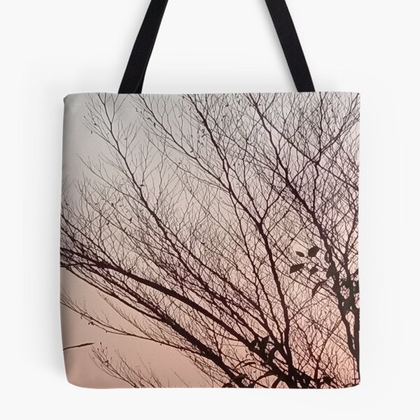 Item preview, Sun set behind tree branches  designed and sold by basitcv.