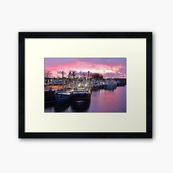 A winter red sky at Kirkcudbright harbour Framed Art Print