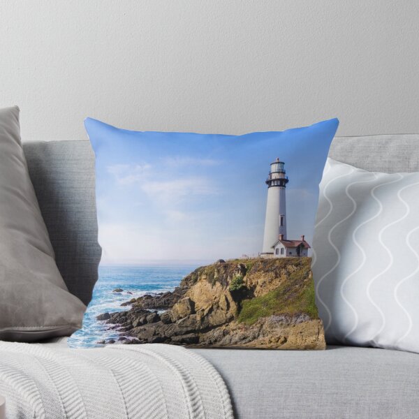 Item preview, Lighthouse on hill blue sky white house ocean designed and sold by mwagie.