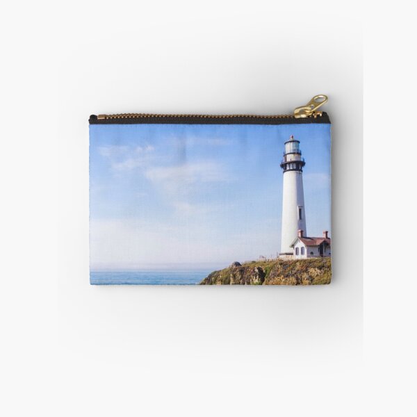 Item preview, Lighthouse on hill blue sky white house ocean designed and sold by mwagie.