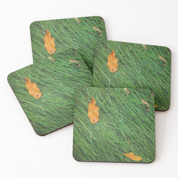 Item preview, green grass field background with dry brown leaves designed and sold by Mrvell.