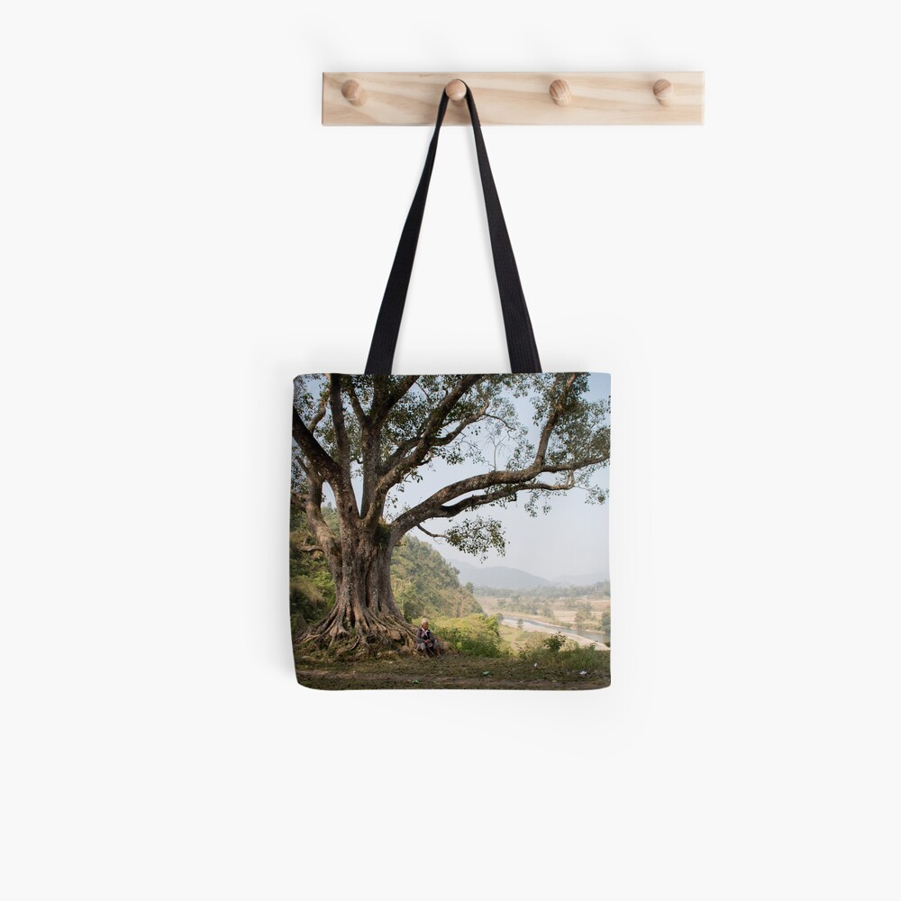 Nepali man sitting under a tree Tote Bag