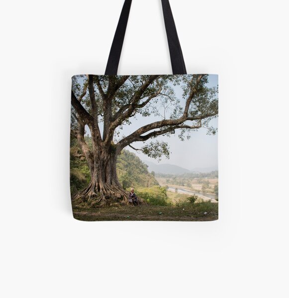 Nepali man sitting under a tree All Over Print Tote Bag