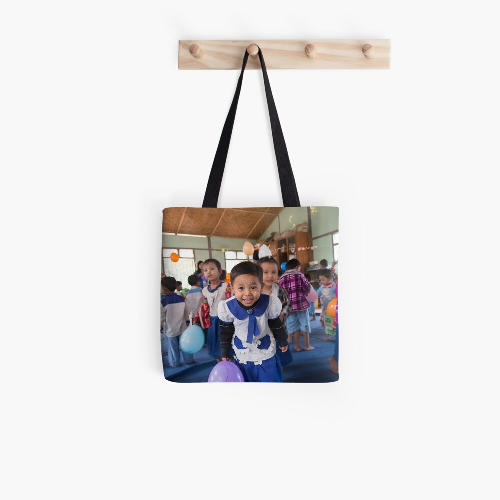 Preschoolers playing with Balloons in Myanmar Tote Bag