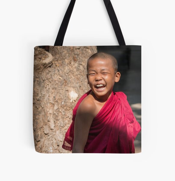 Laughing young monk in Myanmar All Over Print Tote Bag