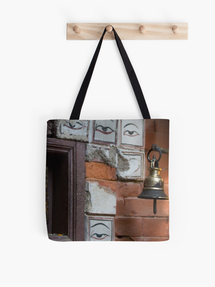 Thumbnail 1 of 2, Tote Bag, Bell and buddha eyes in a buddhist temple designed and sold by missatgerebut.