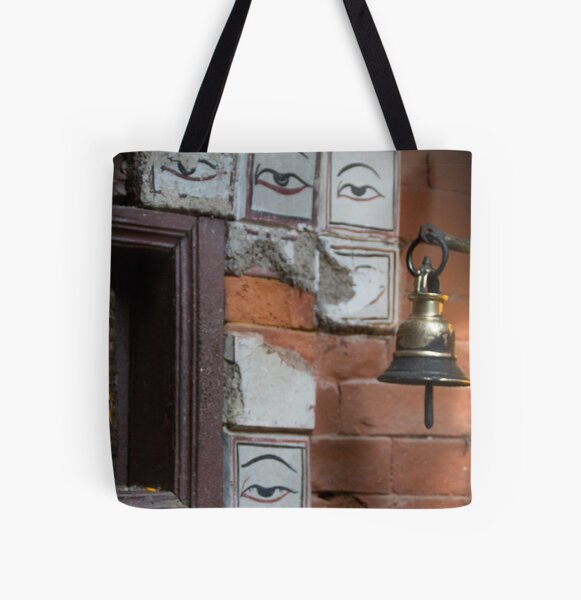 Bell and buddha eyes in a buddhist temple All Over Print Tote Bag