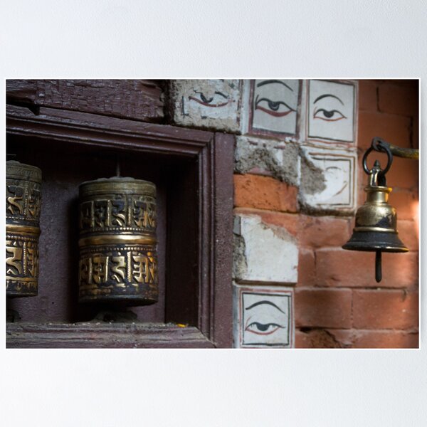 Bell and buddha eyes in a buddhist temple Poster
