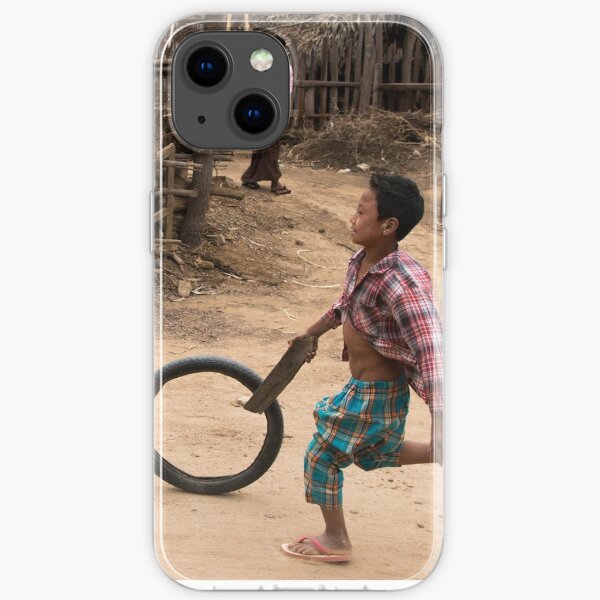 A Child Playing With A Wheel in Myanmar iPhone Soft Case