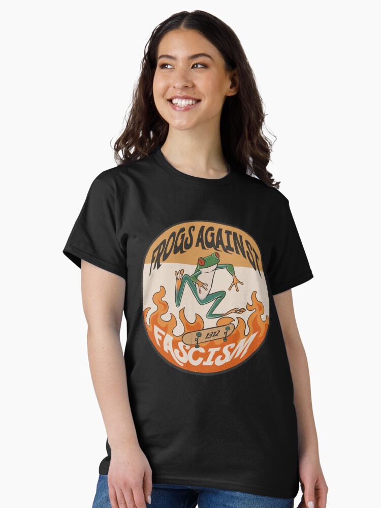 Thumbnail 1 of 7, Classic T-Shirt, Frogs against fascism designed and sold by vertarsenic.