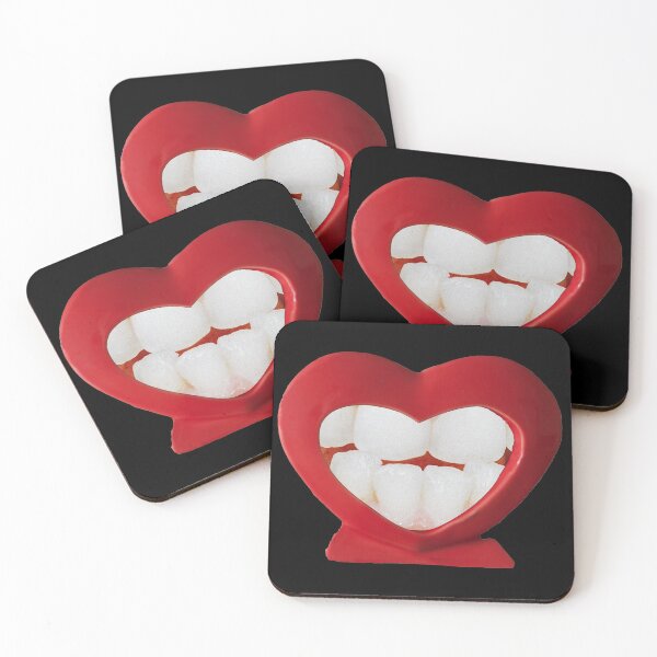 Item preview, Ceramic Heart showing teeth behind designed and sold by Tom Carpenter.