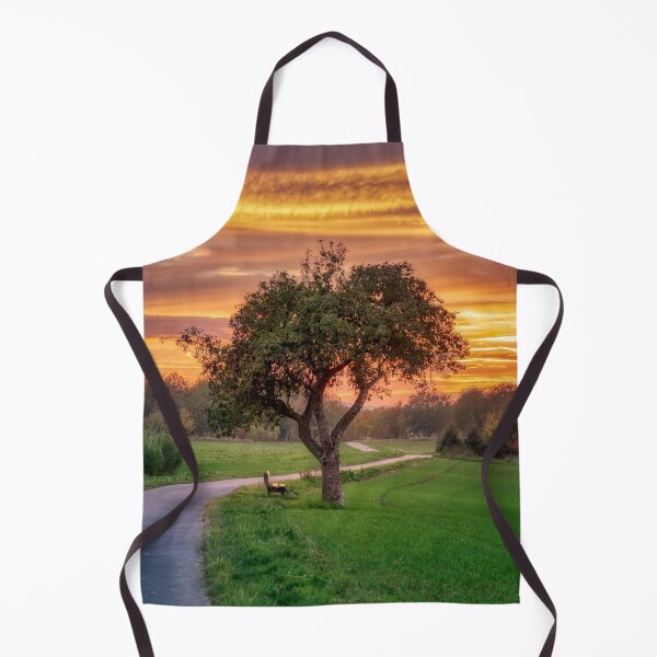Item preview, Apple tree beside a path at sunset designed and sold by Katho Menden.