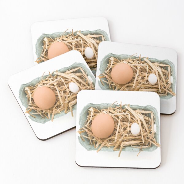 Item preview, Two very different eggs isolated on white designed and sold by Grégory DUBUS.