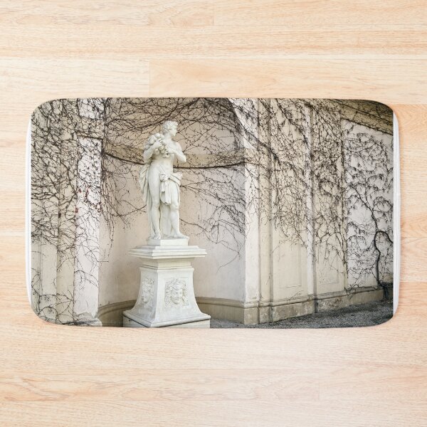 Item preview, Statue and wall with creeper plant in Vienna autumn season vintage designed and sold by goceris.