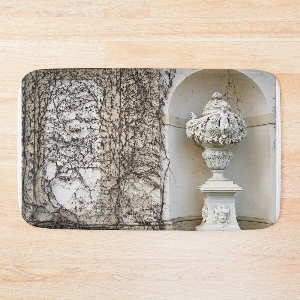 Item preview, Statue and wall with creeper plant in Vienna autumn season designed and sold by goceris.