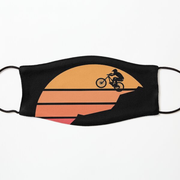 Mountain bike silhouette in the sunset Kids Mask