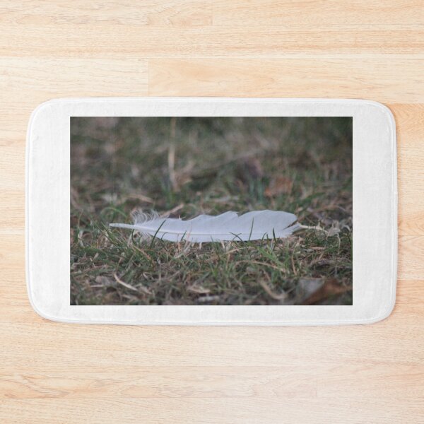 Item preview, White feather on grass designed and sold by Emma  Amies.