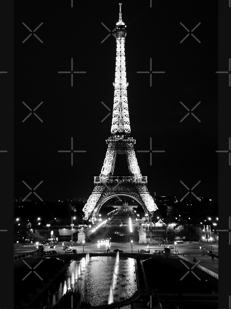 eiffel tower at night black and white