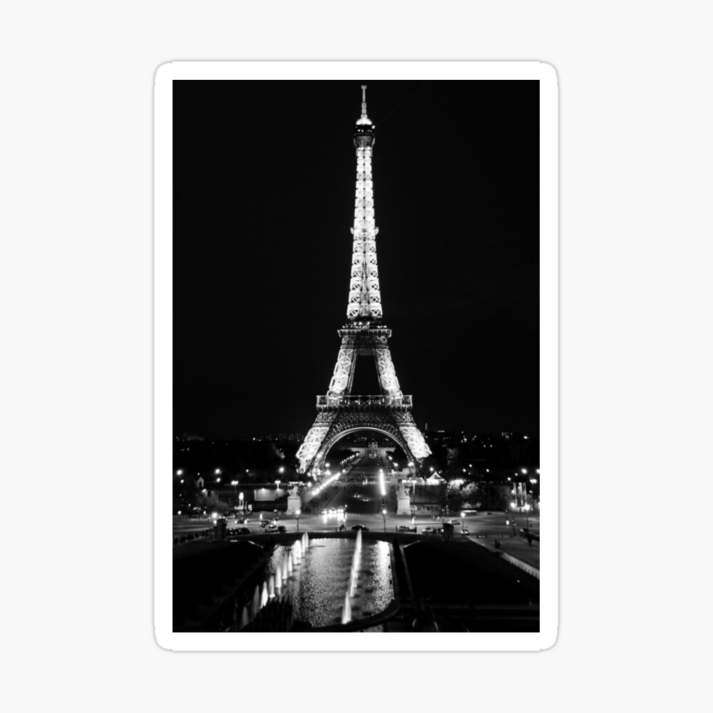 eiffel tower at night black and white