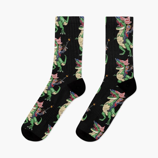 Item preview, Machine Gun Trump On T Rex Dinosaur With American Flag designed and sold by BUBLTEES.