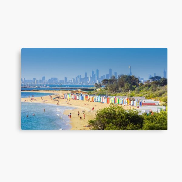 Brighton Bath Huts and the Melbourne Skyline Canvas Print