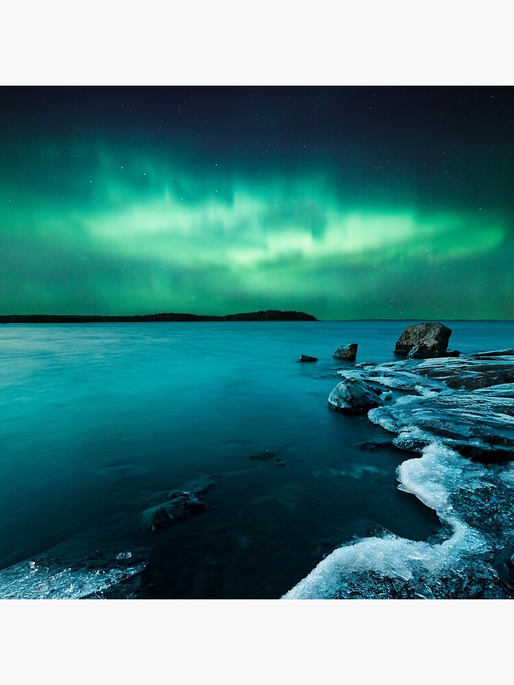 Ice on the lake shore and northern lights landscape by Juhku