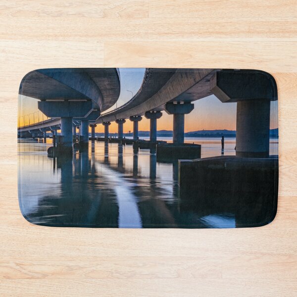Item preview, Curving lines and calm water under Tauranga Harbour Bridge at sunrise. designed and sold by Brian Scantlebury.