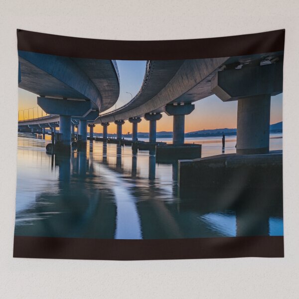 Item preview, Curving lines and calm water under Tauranga Harbour Bridge at sunrise. designed and sold by Brian Scantlebury.