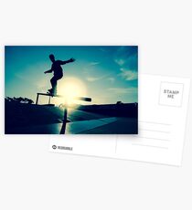 Skateboarder silhouette on a grind Postcards