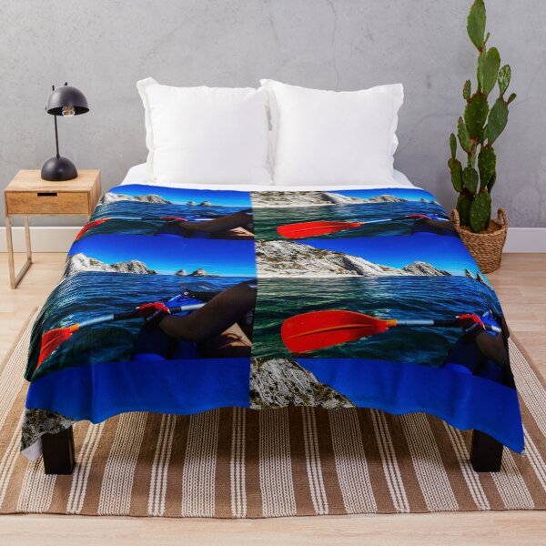 Item preview, young people in a canoe with a rock face in the middle of the sea designed and sold by Lighthouse1997.