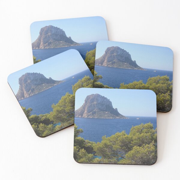Item preview, The solitary islet of Es Vedra in contrast against the blue sea of ​​Ibiza immersed in the green and arid wild nature in Spain designed and sold by alessiapenny.