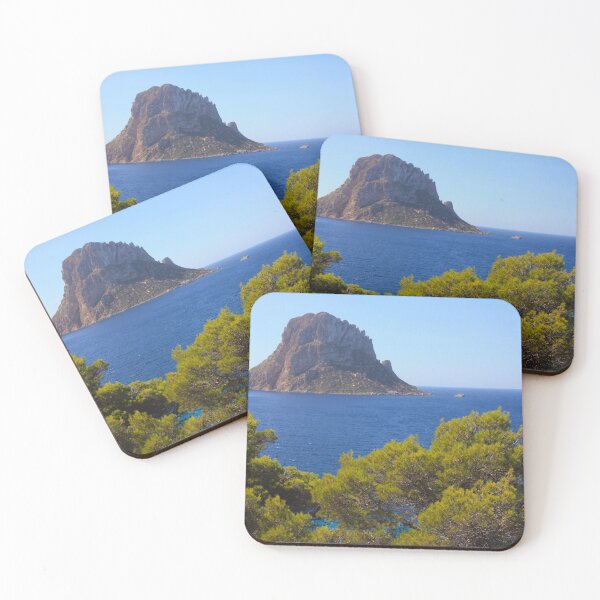 Item preview, The solitary islet of Es Vedra in contrast against the blue sea of ​​Ibiza immersed in the green and arid wild nature in Spain designed and sold by alessiapenny.