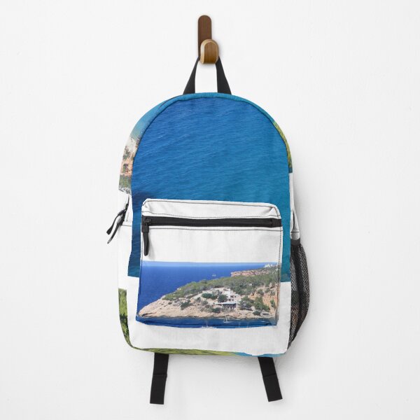 Item preview, The solitary islet of Es Vedra in contrast against the blue sea of Ibiza immersed in the green and arid wild nature in Spain designed and sold by alessiapenny.