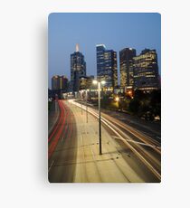 Batman to city Canvas Print