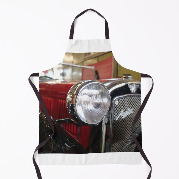Item preview, Head light of a vintage red car with background blur designed and sold by santoshputhran.