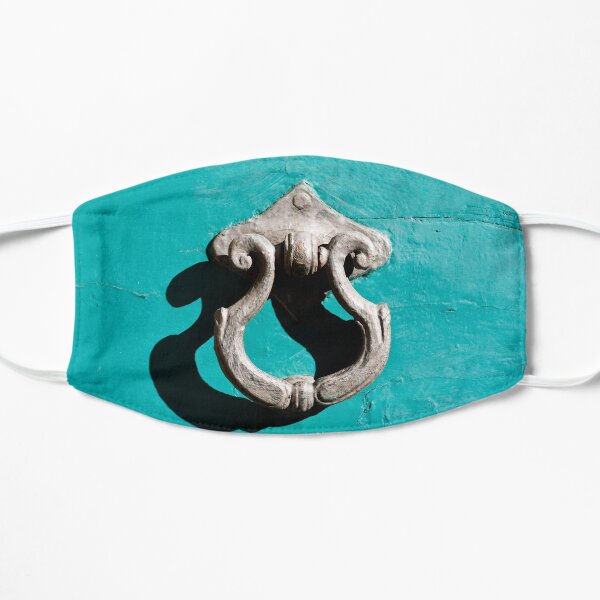 Antique Door Knocker on a Turquoise Painted Door Mask