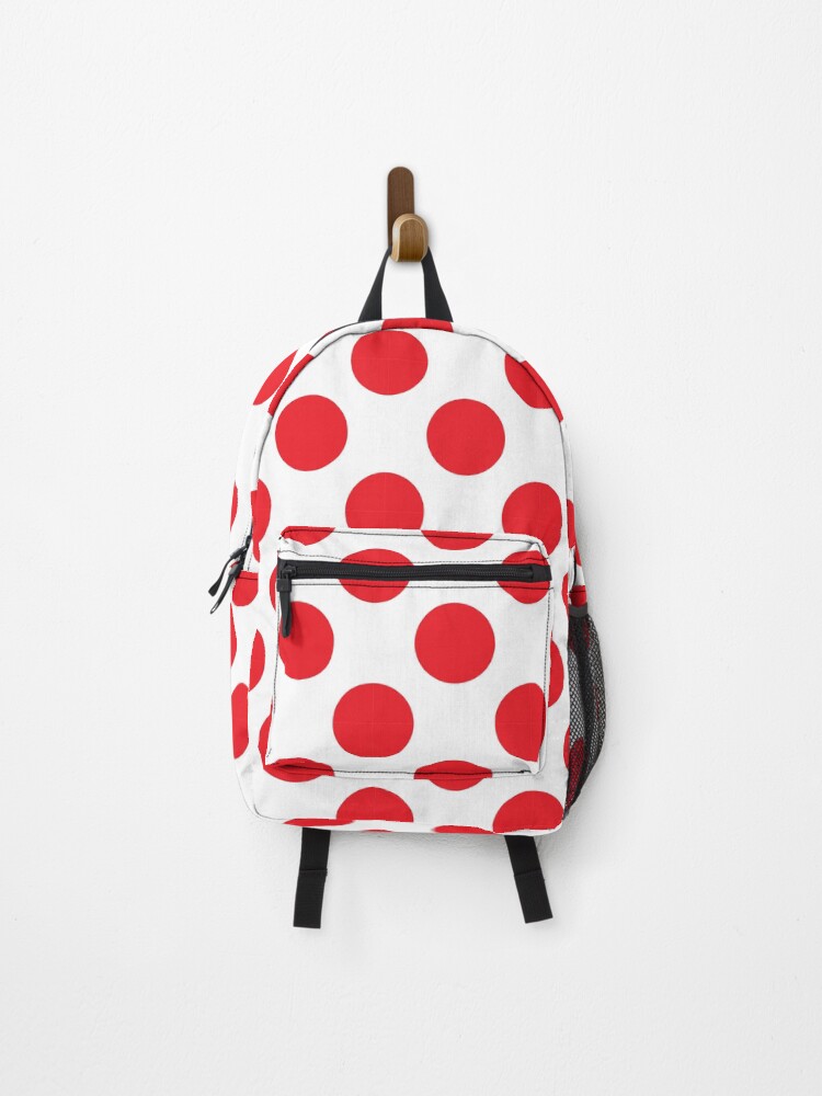 red polka dot backpack