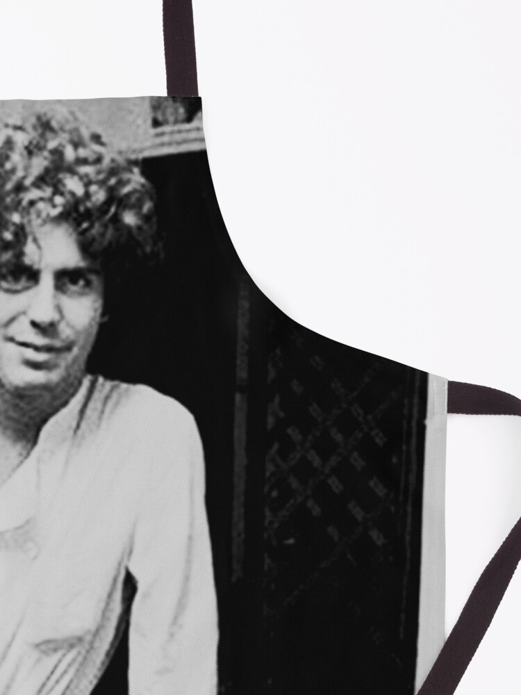 Alternate view of young Anthony Bourdain preparing sushi rolls Apron
