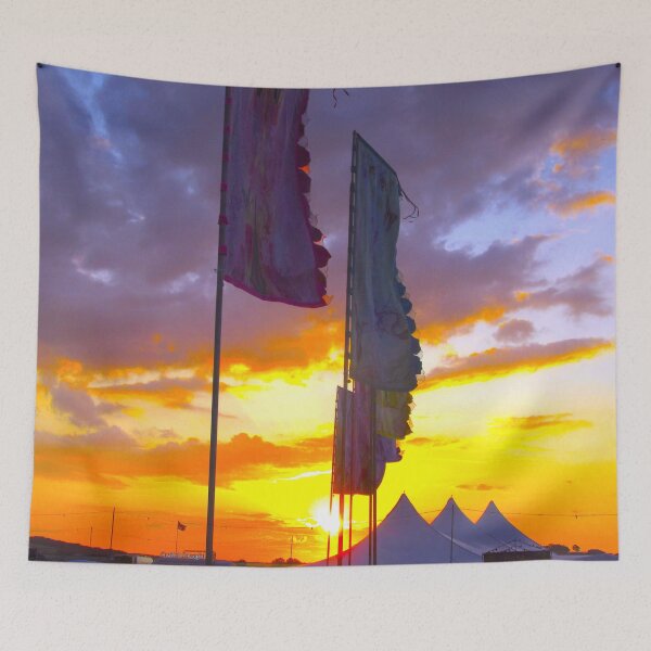 Item preview, LINDISFARNE MUSIC FESTIVAL Flags In Sunset designed and sold by Andrew Morrell.
