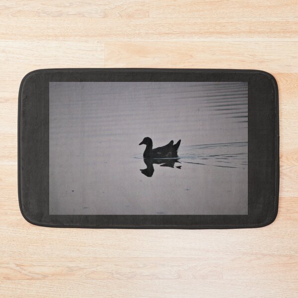 Item preview, Silhoutted bird swimming on a calm lake designed and sold by Emma  Amies.
