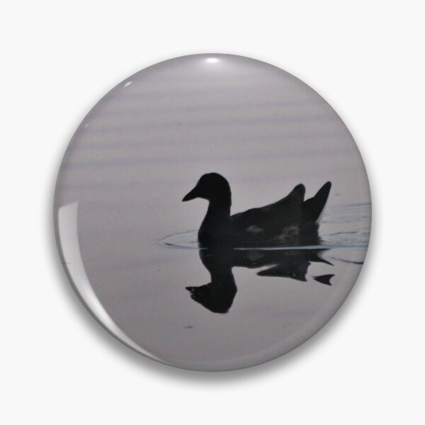 Item preview, Silhoutted bird swimming on a calm lake designed and sold by Emma  Amies.