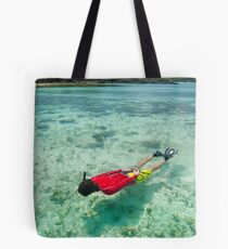 Man snorkeling in shallow water Tote Bag